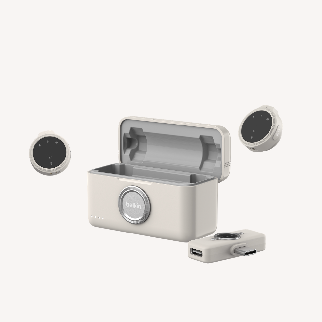 Belkin audio accessories charging case with two earbuds displayed.