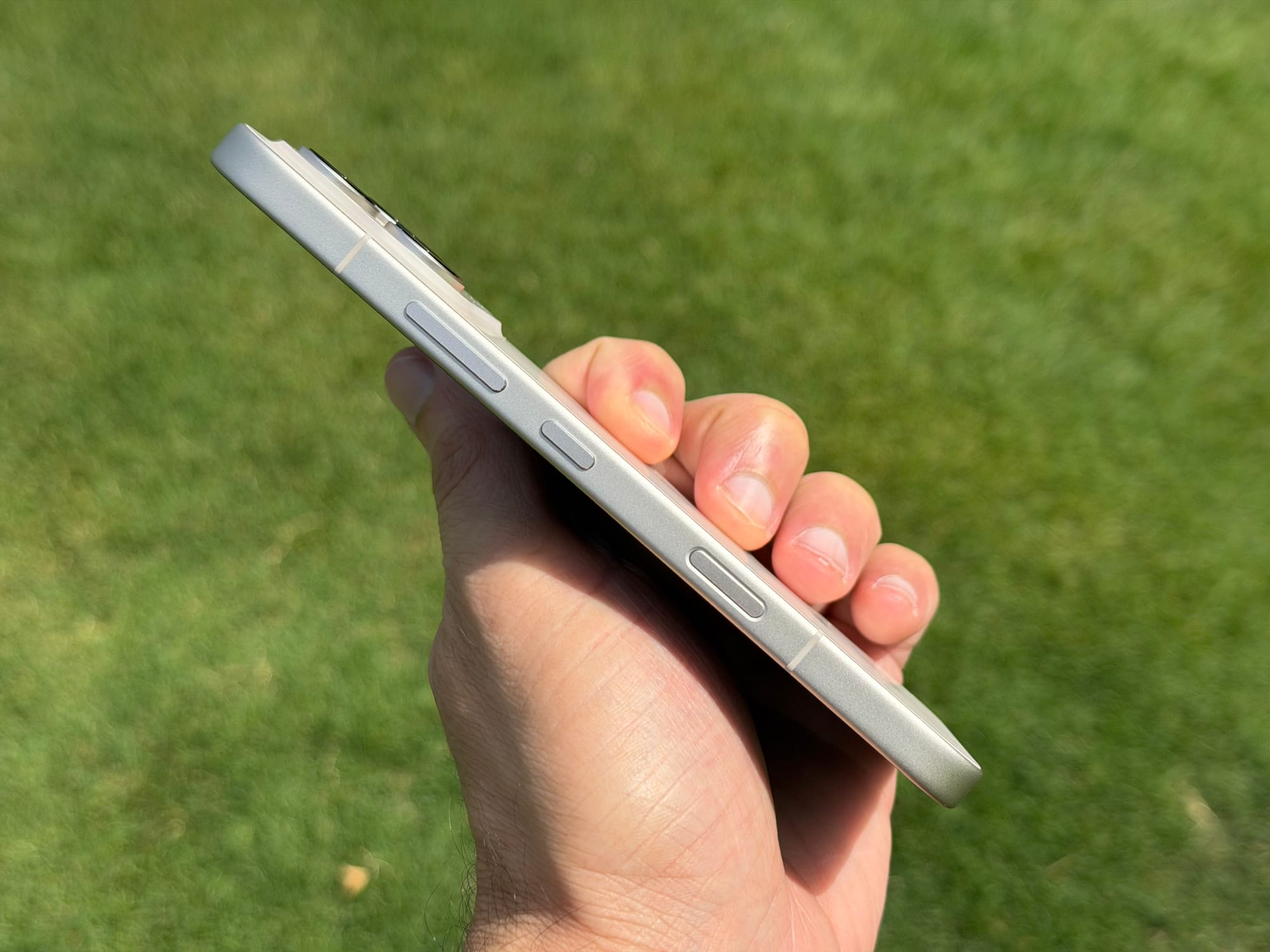 Side view of Honor 600 Pro showing the button layout and slim profile.