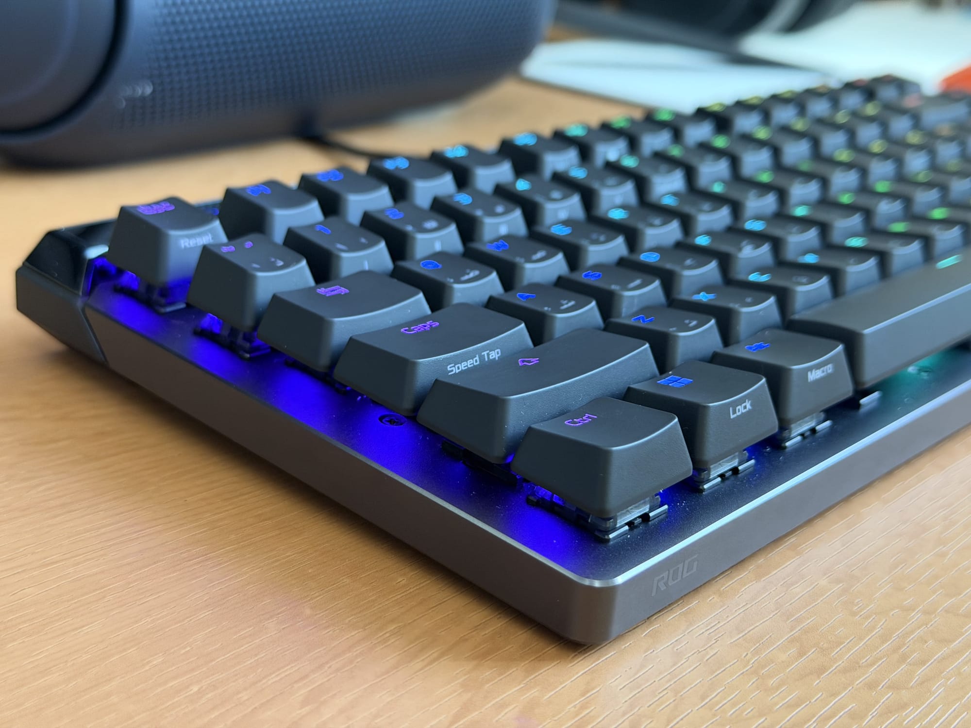 ASUS ROG Falchion Ace 75 HE keyboard showcasing RGB lighting and mechanical key design.