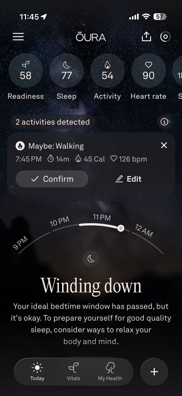Oura app displaying activity suggestions with a bedtime notification.