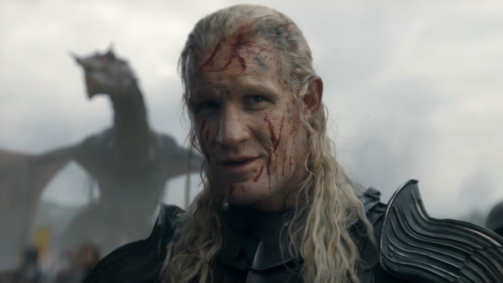 Armored character with battle scars, showing a fierce expression with a dragon in the background.