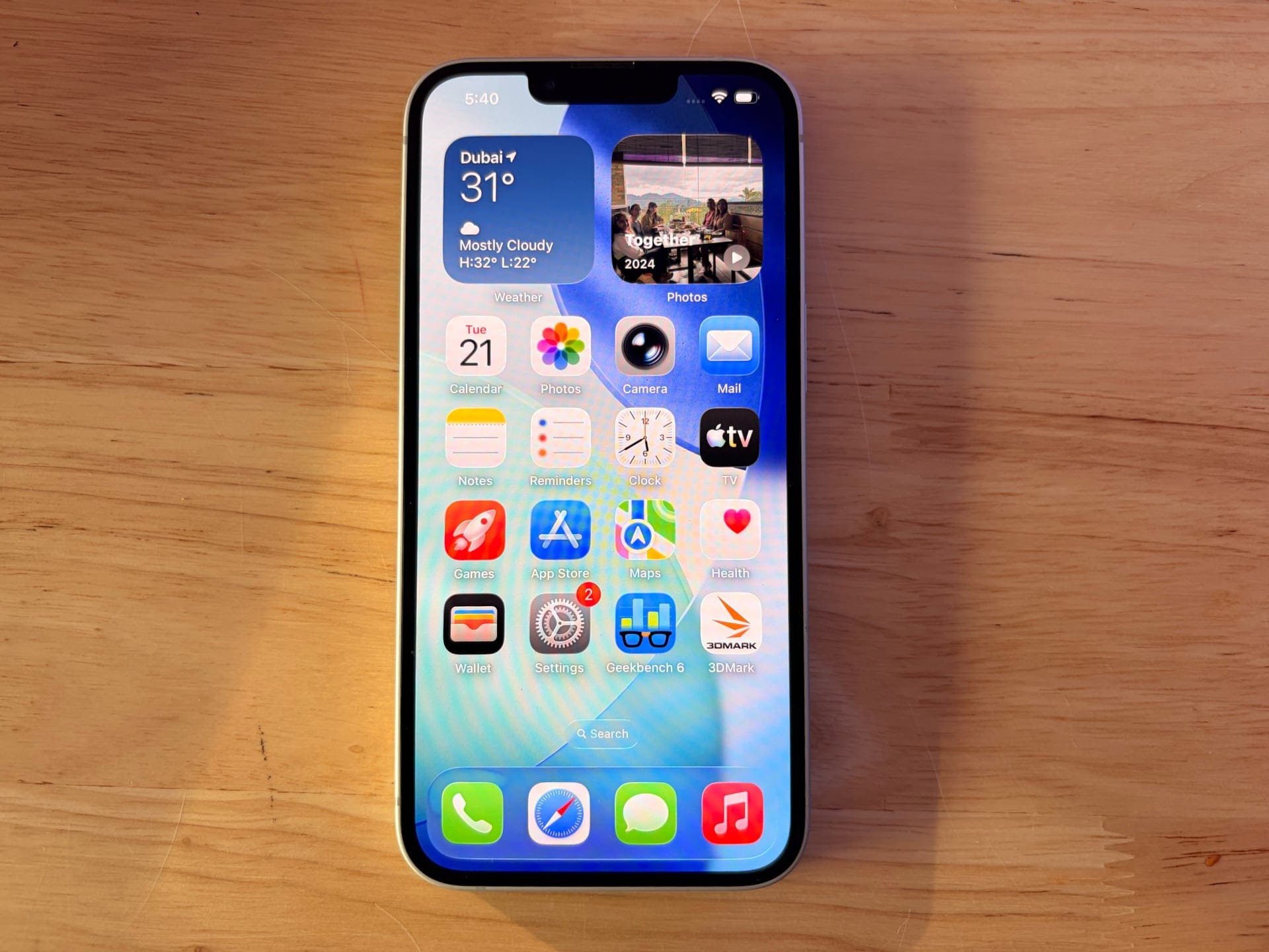 Front view of the iPhone 17 displaying the home screen.