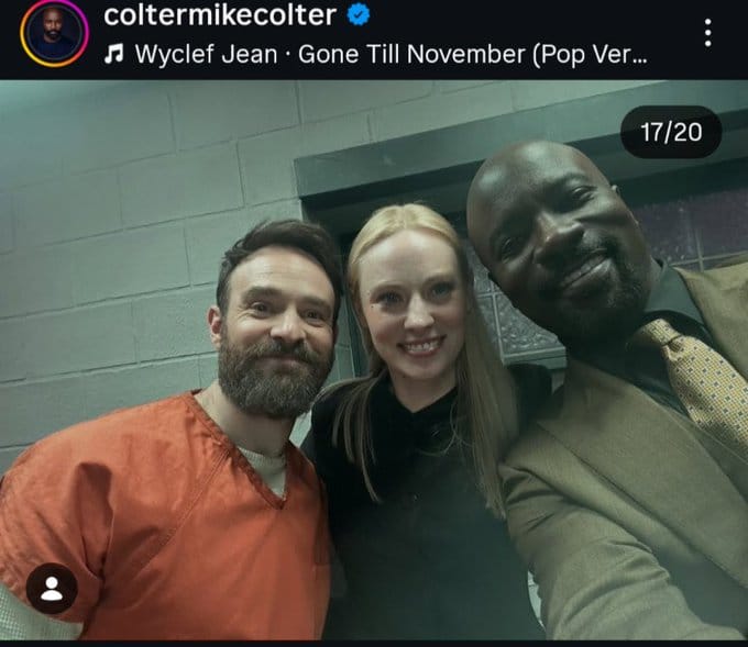 Colter, a cast member, poses with two others backstage, all smiling and dressed in casual clothing.