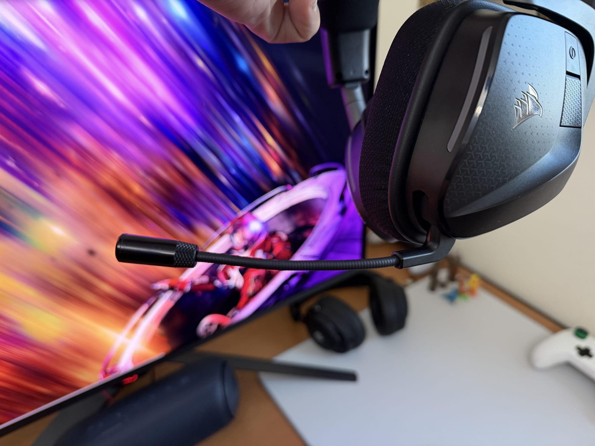 Corsair Void v2 MAX Wireless microphone extended with headset and colorful background
