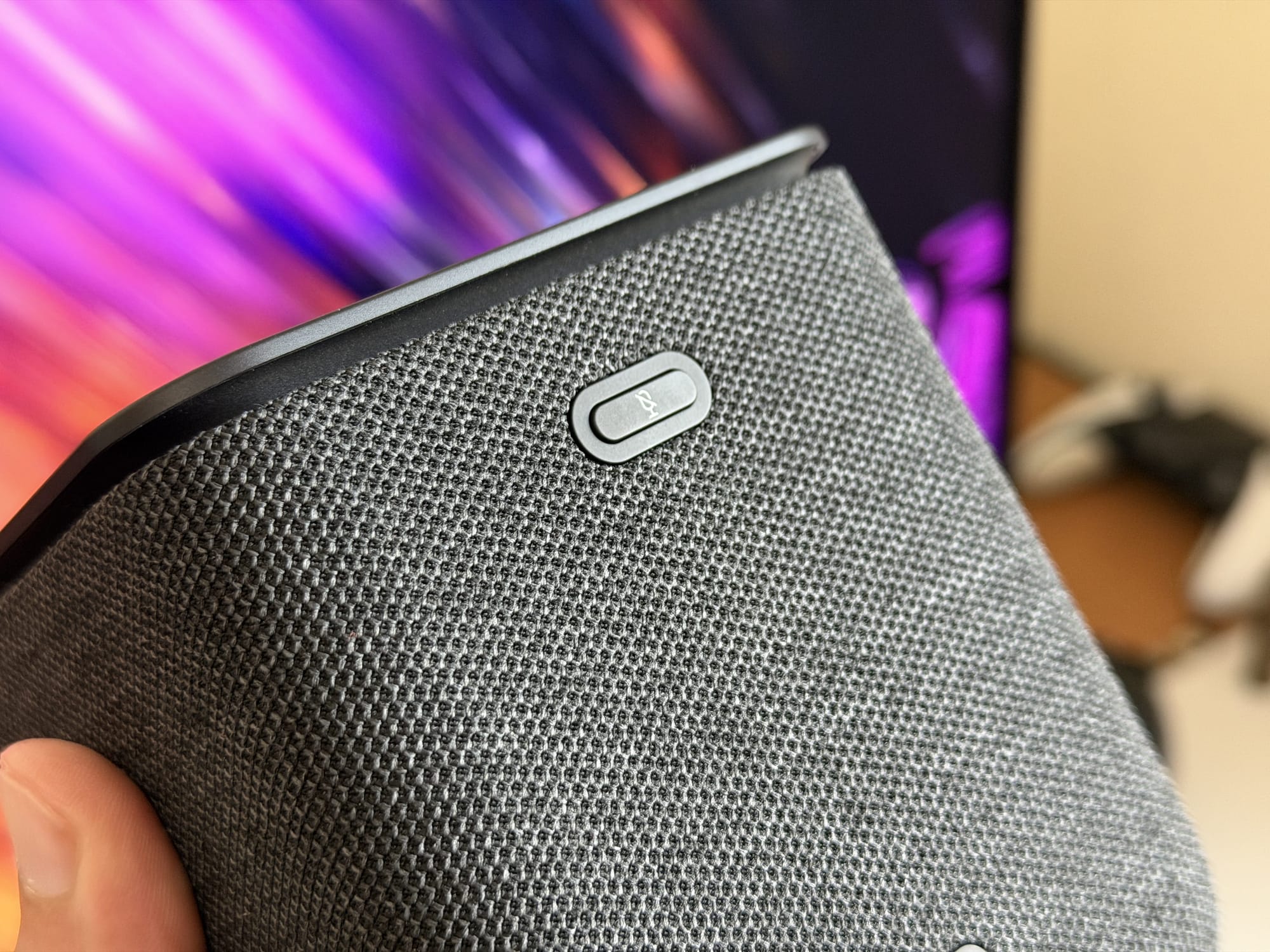 Close-up of power button on the Yasmina Midi smart speaker.