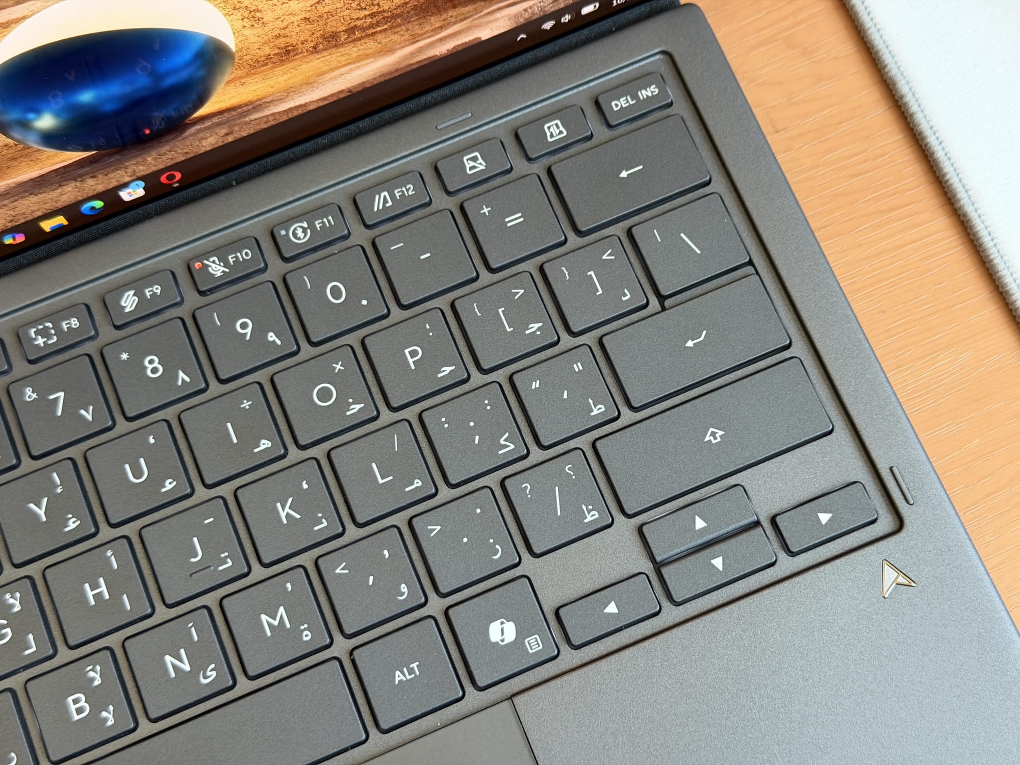 Close-up of ASUS ZenBook Duo keyboard featuring a layout with unique key placements