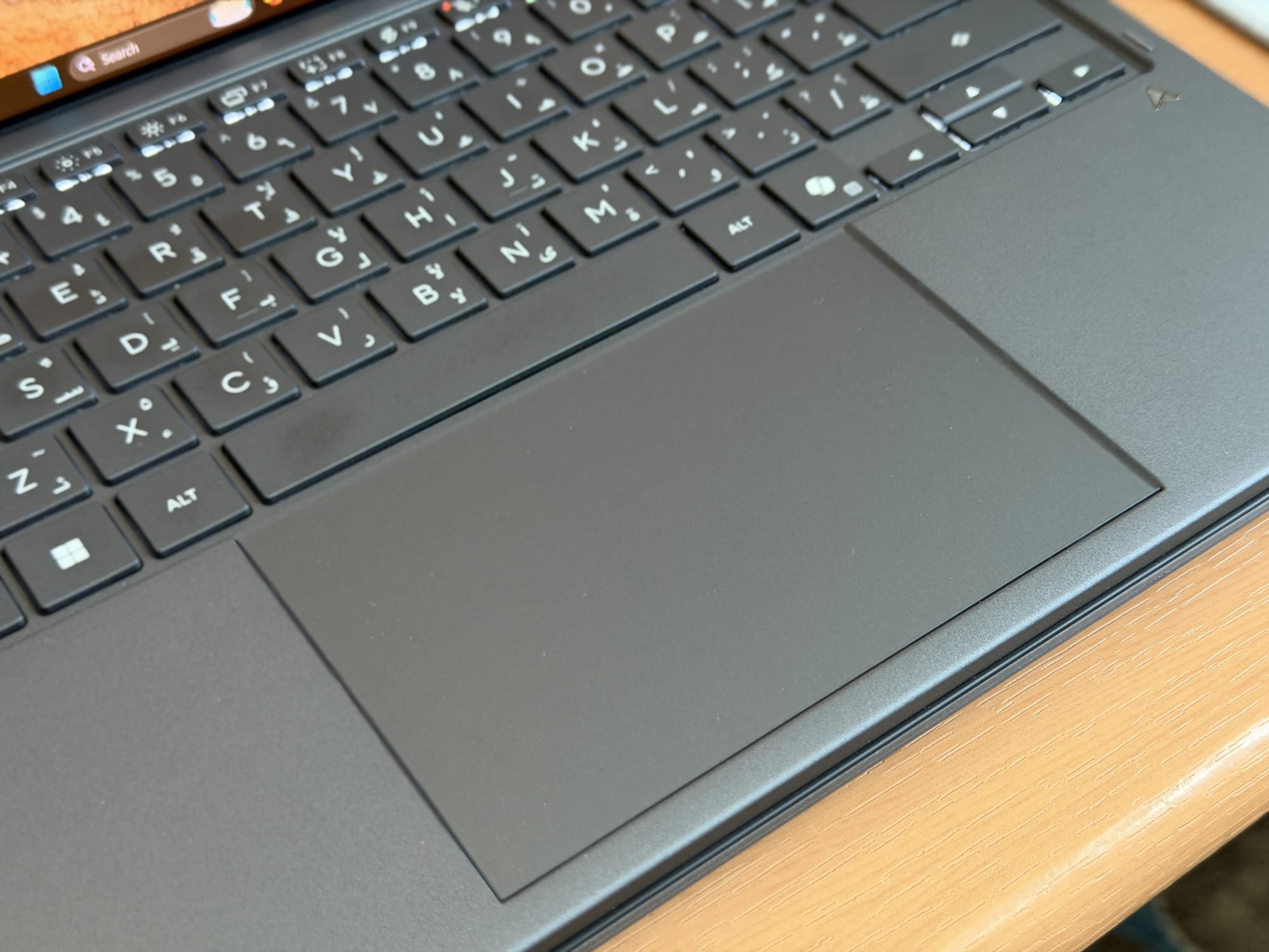 ASUS ZenBook Duo touchpad with minimalistic design and smooth surface