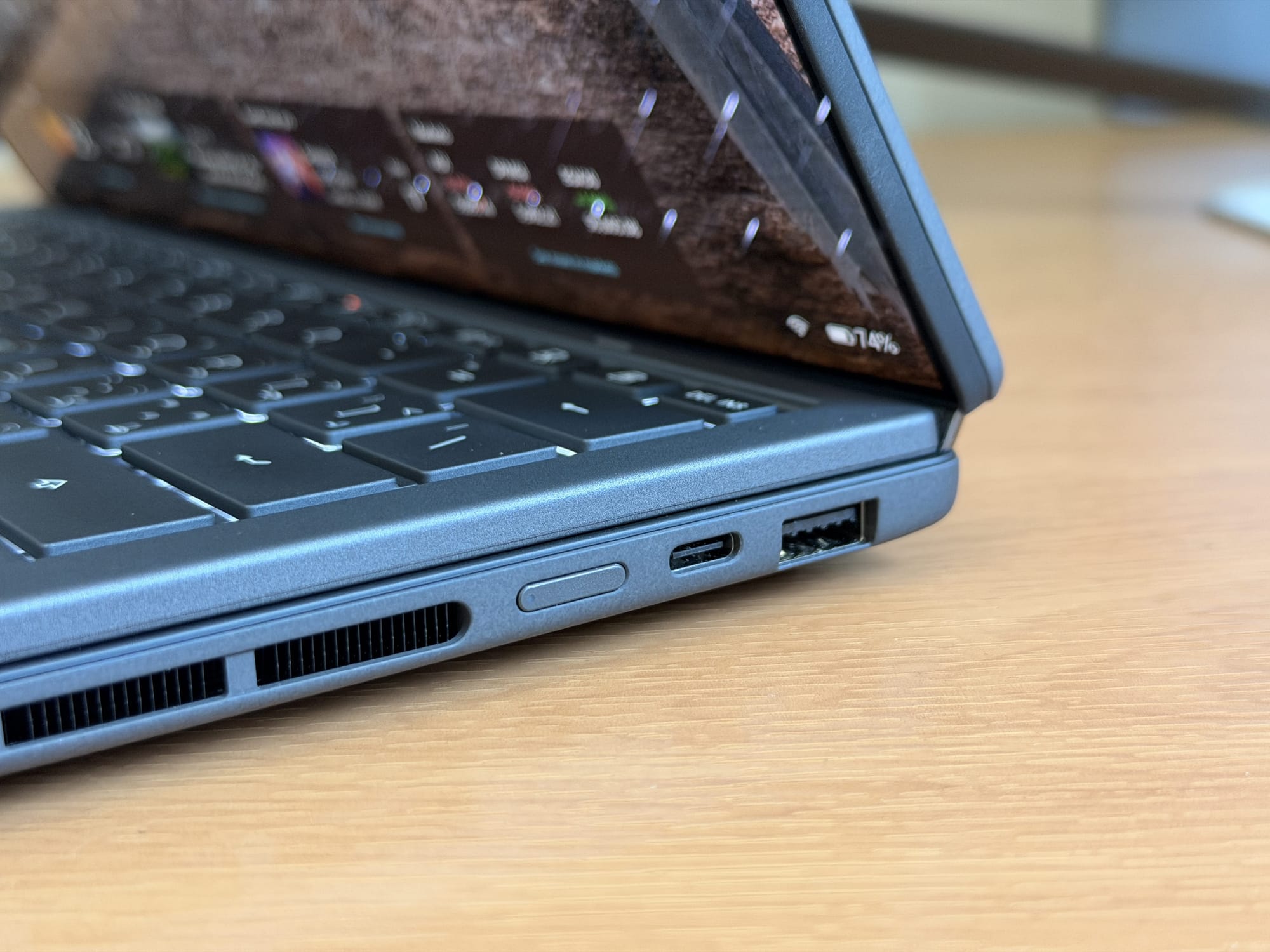 Right side of ASUS ZenBook Duo showing charging port and network connectivity options