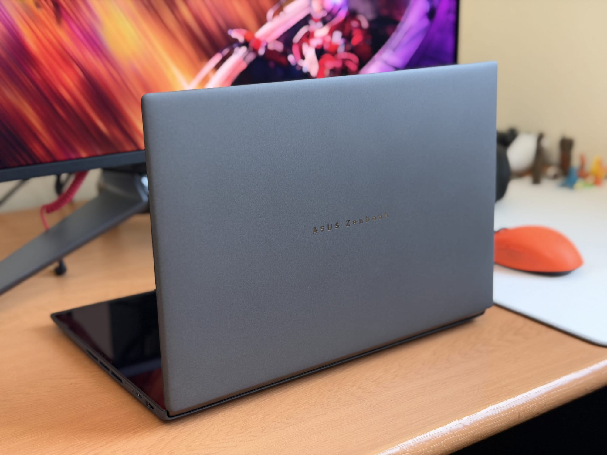 ASUS ZenBook Duo showing sleek design with ZenBook branding on the lid
