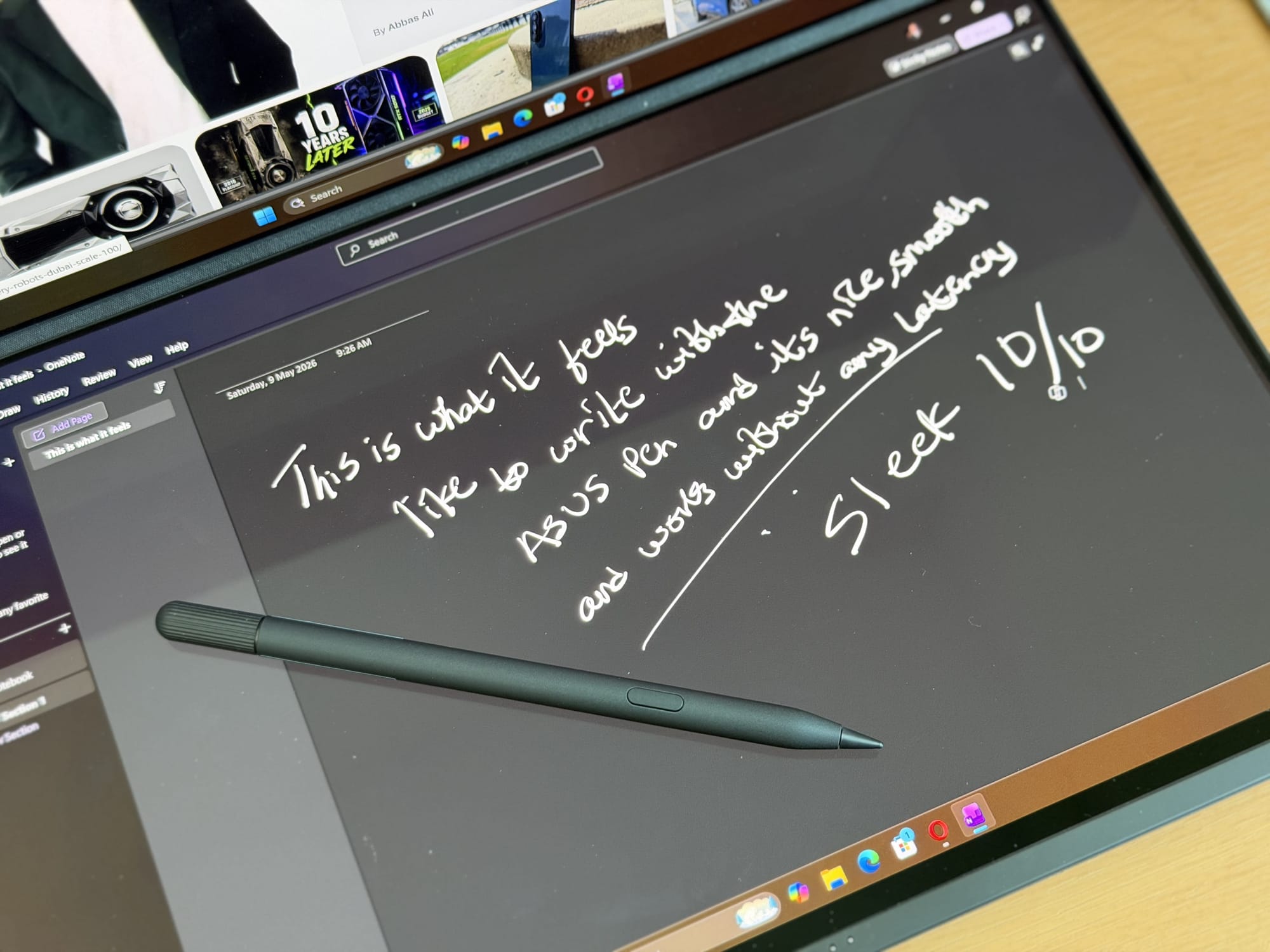 The Asus ZenBook Duo 2026 screen displaying handwritten feedback with a stylus beside it.