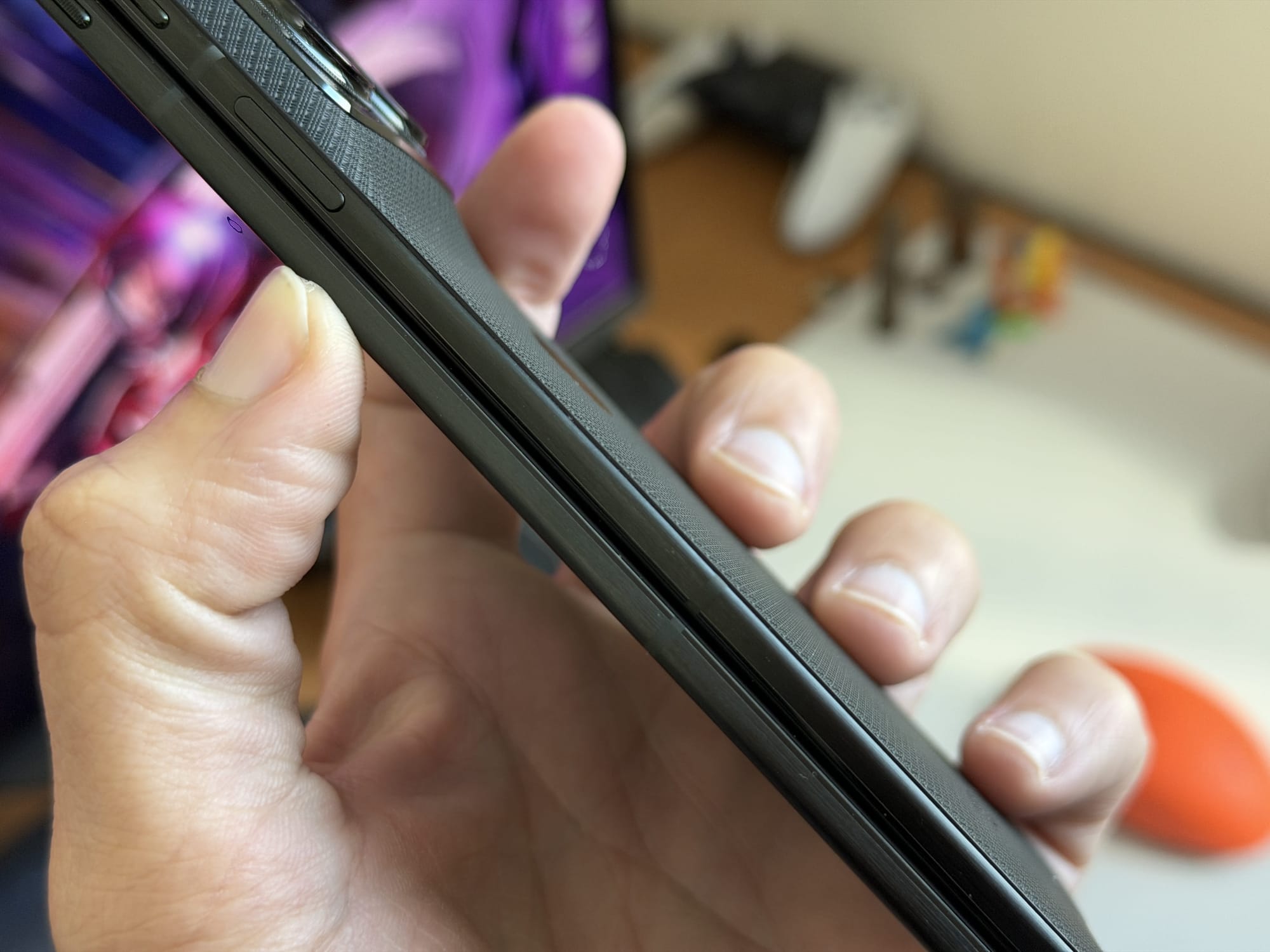 Close-up of the Motorola Razr Fold's edge, highlighting the slim profile.