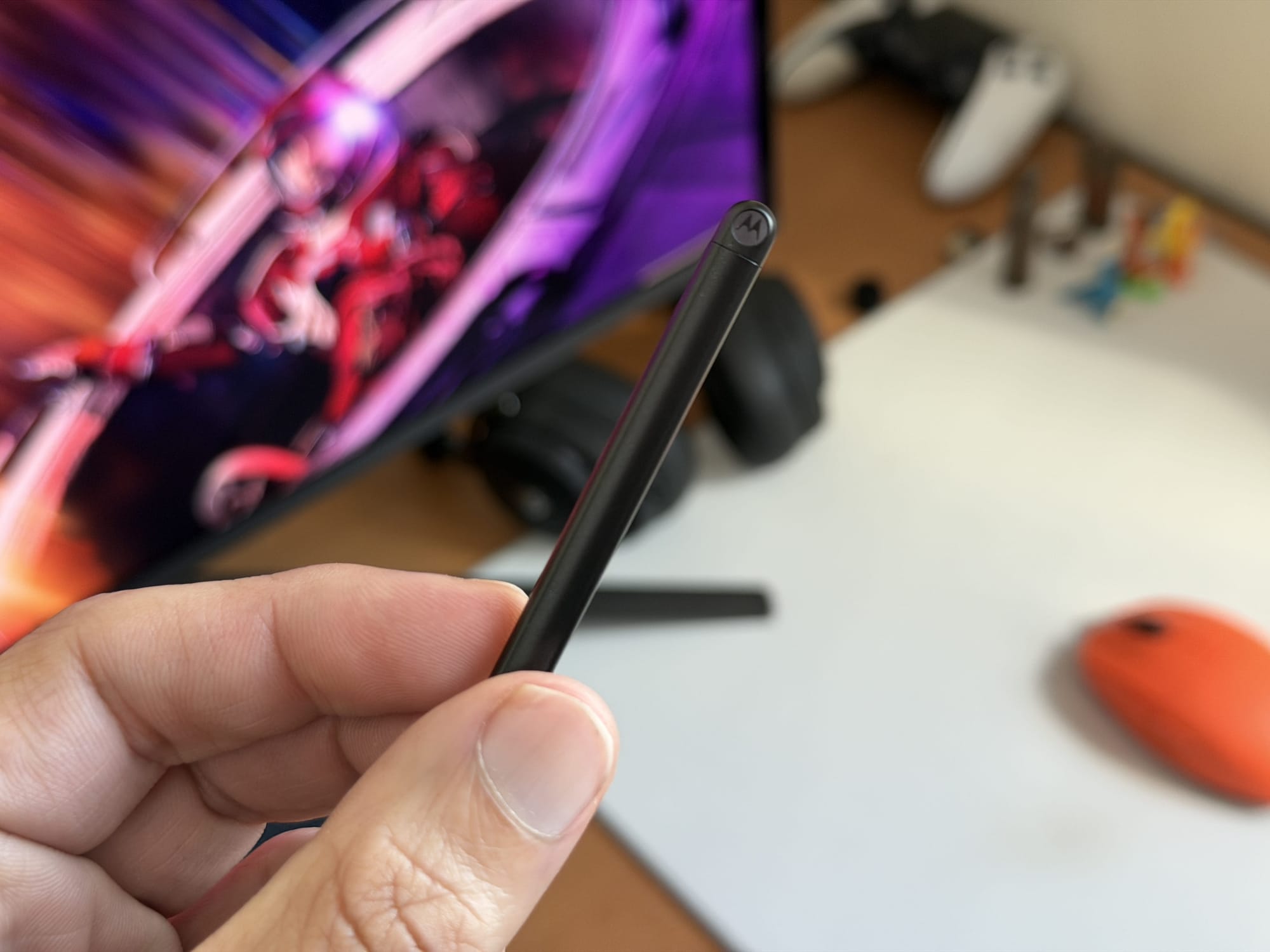Top view of Motorola stylus pen, highlighting its rounded tip and minimalist design.
