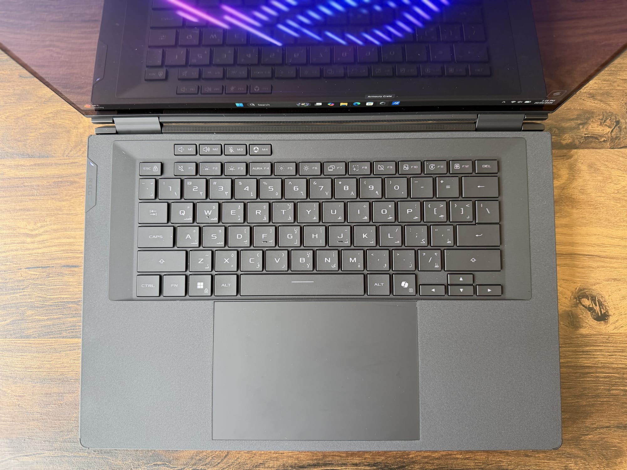 Top-down view of the Zephyrus Duo's flat keyboard deck and trackpad