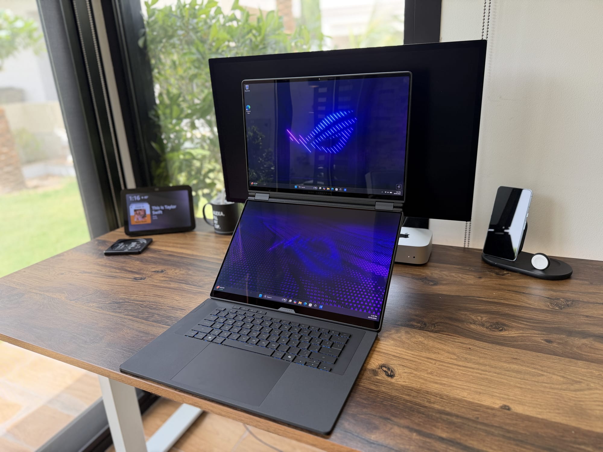 The Zephyrus Duo in stacked dual-screen mode with the wireless keyboard detached in front