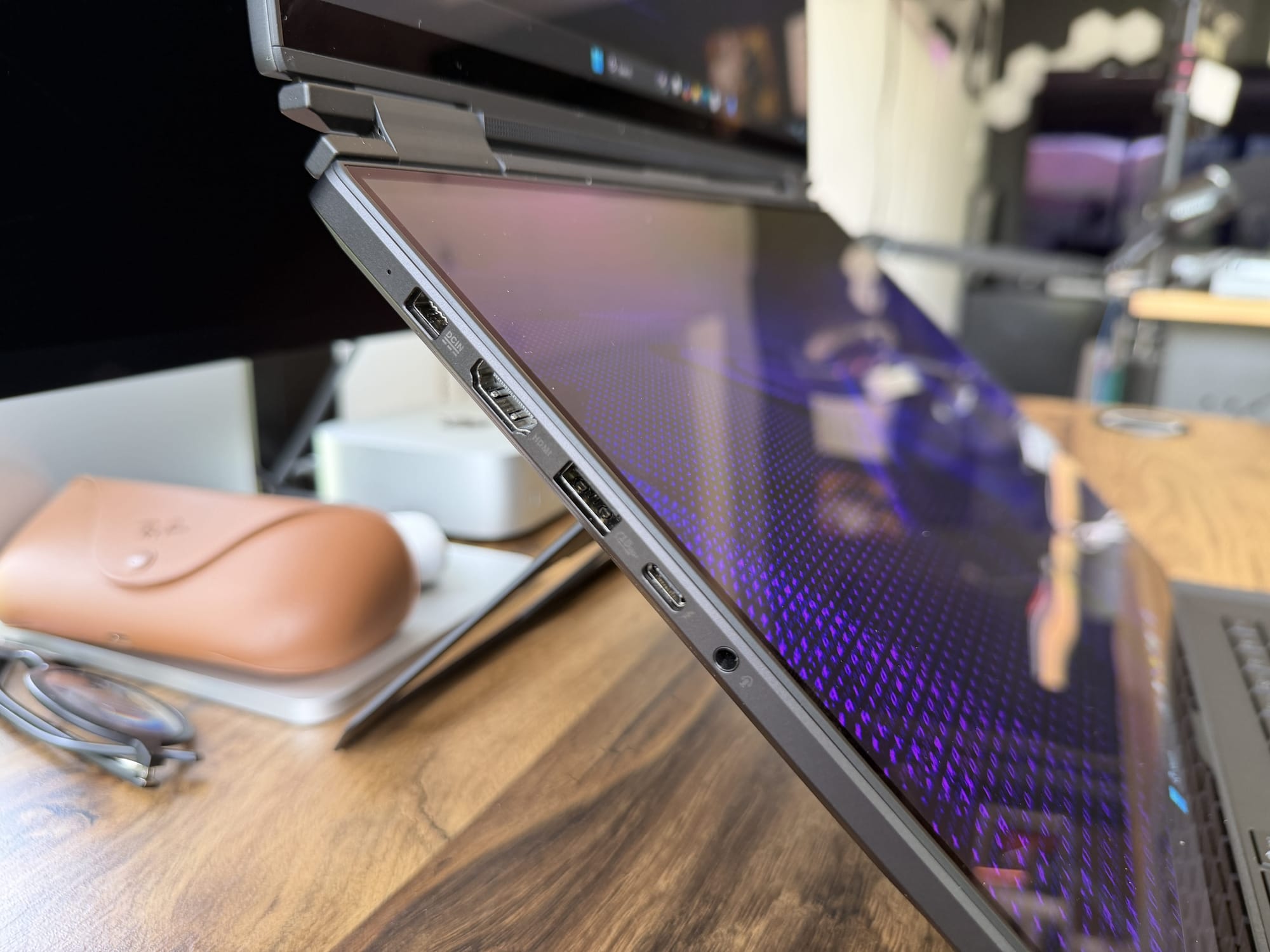 Side profile of the Zephyrus Duo propped open in dual-screen mode