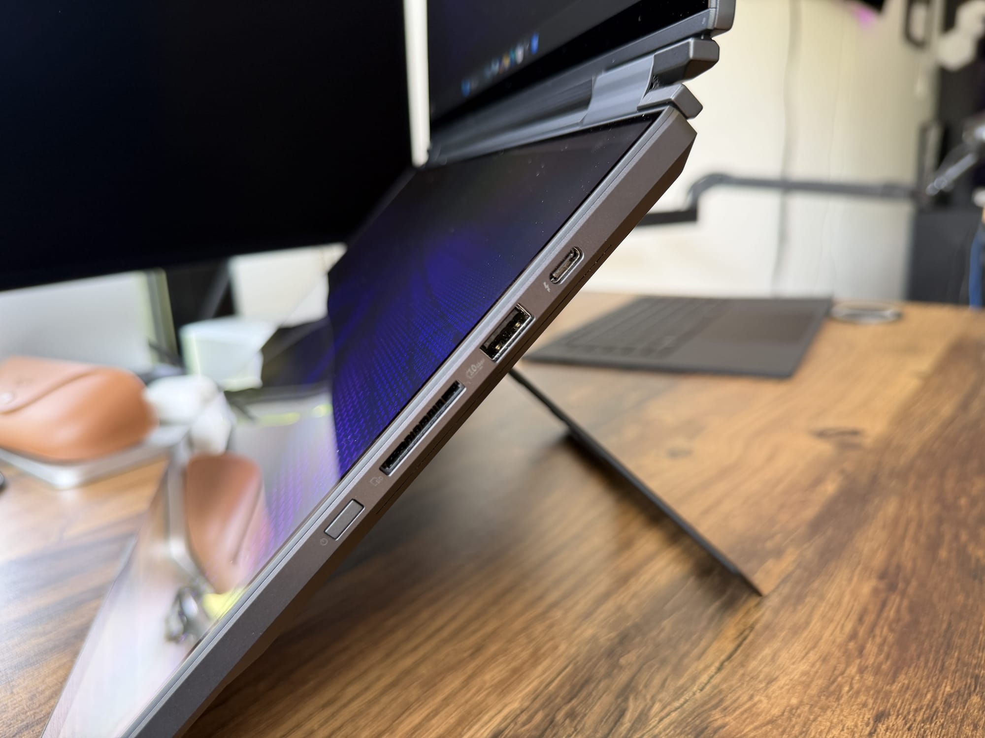 Left-side ports on the Zephyrus Duo, including USB-A, Thunderbolt 4, power and audio