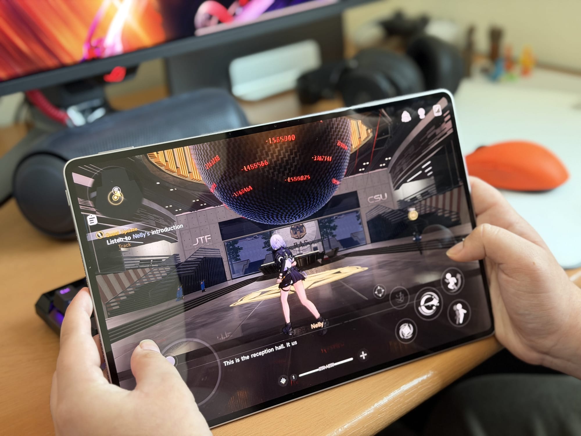 User engaged in gameplay on Honor MagicPad 4, game interface visible.