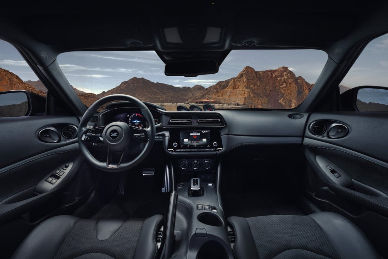 Interior view of the Nissan Z Heritage Edition showcasing the dashboard and touchscreen display.