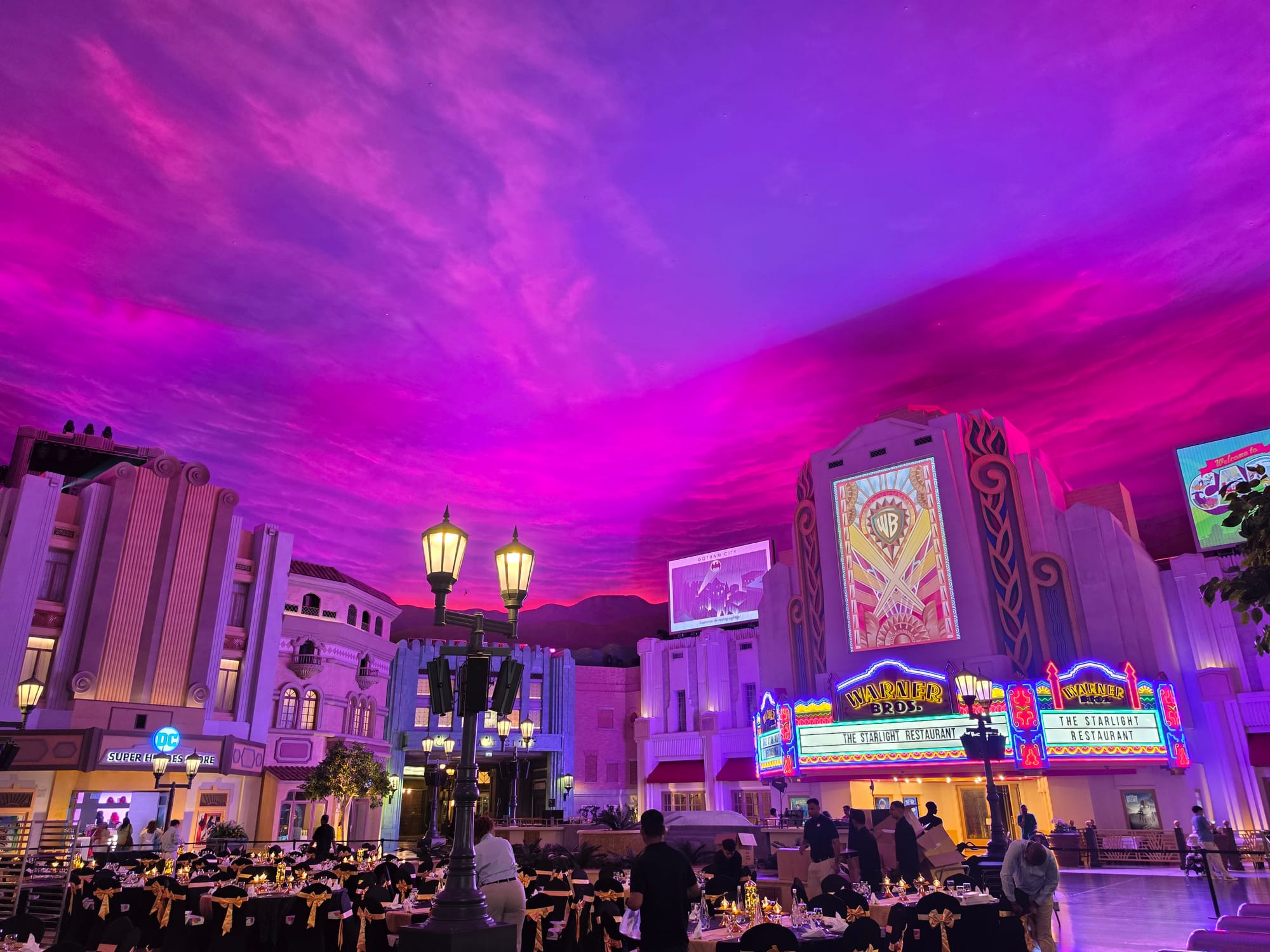 Vibrant purple ceiling in an entertainment space with vintage decor