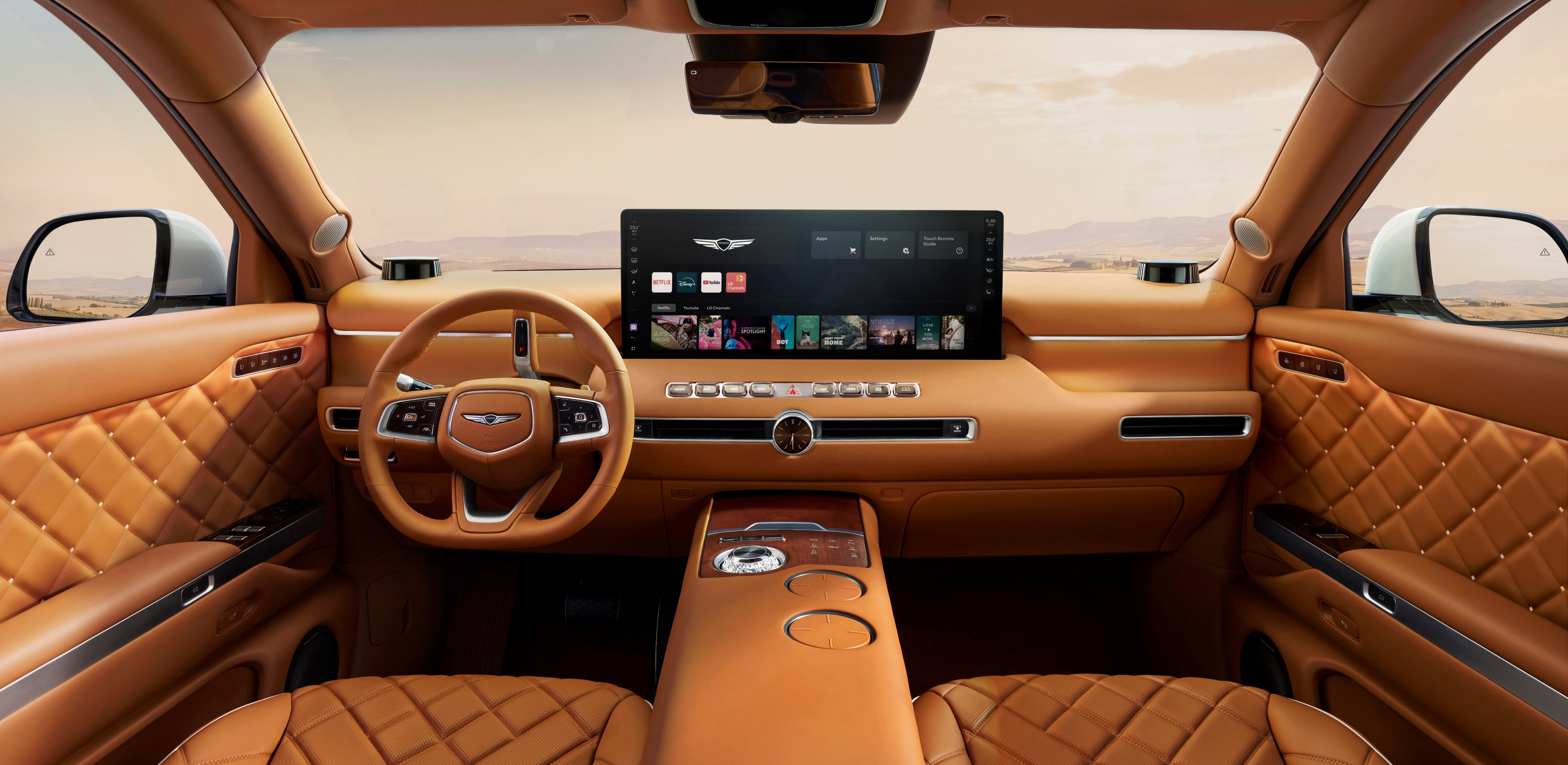 Genesis GV90 OLED display raised from the centre console in the flagship electric SUV cabin