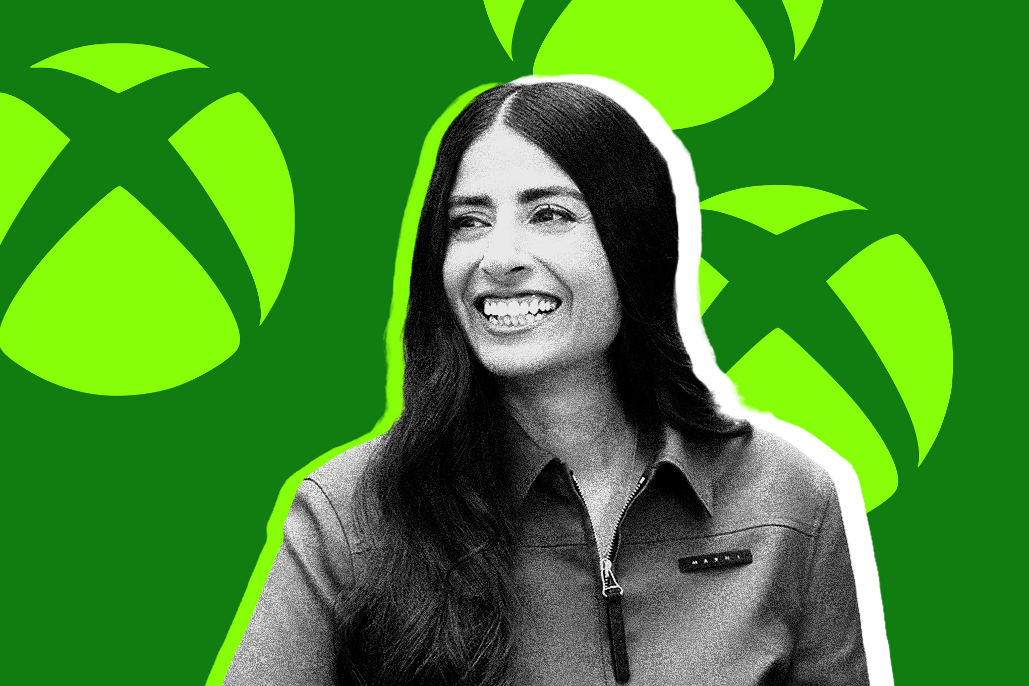Asha Sharma, Xbox CEO, in front of green Xbox logo backdrop
