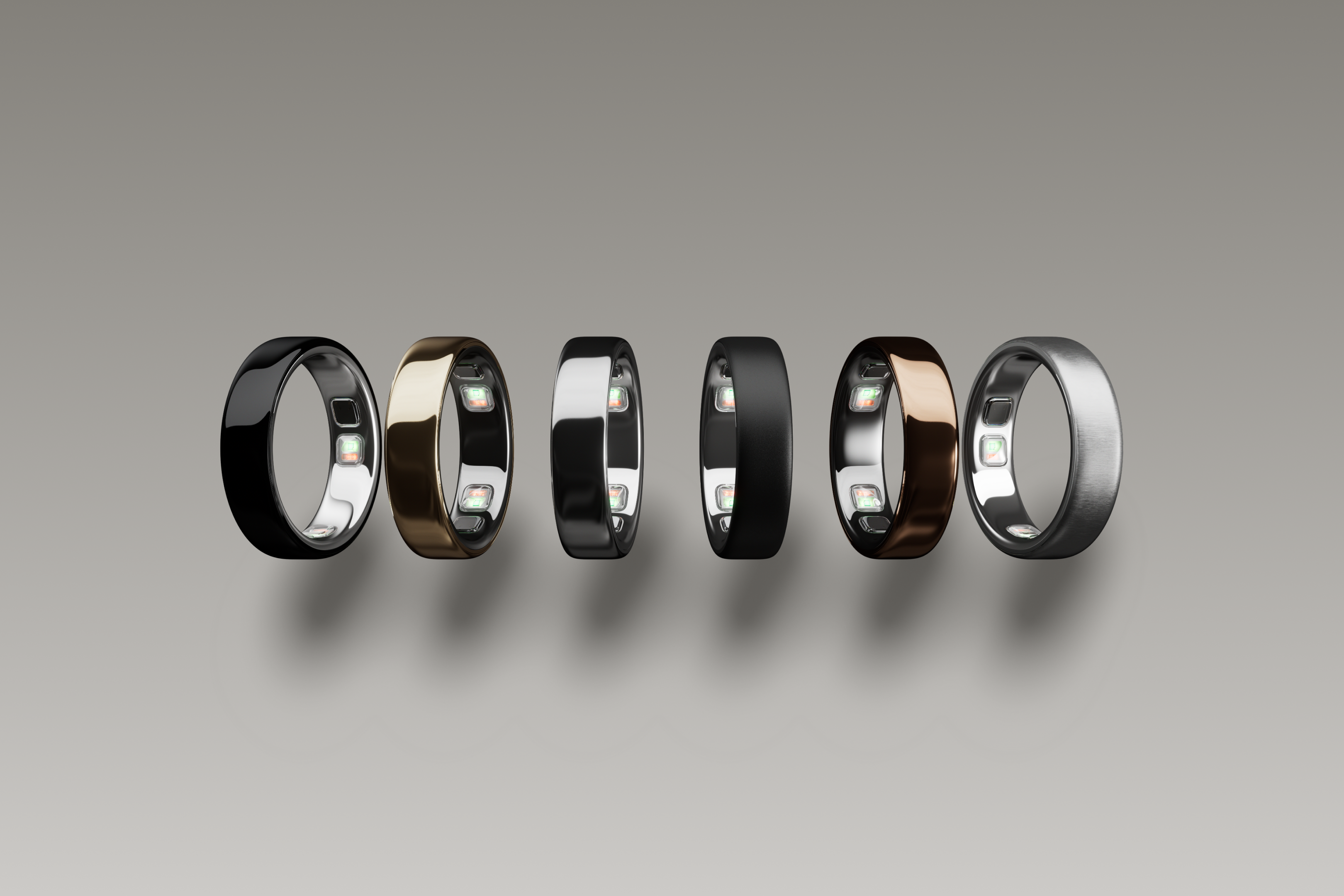 Six Oura Ring 5 smart rings in glossy and matte metallic finishes