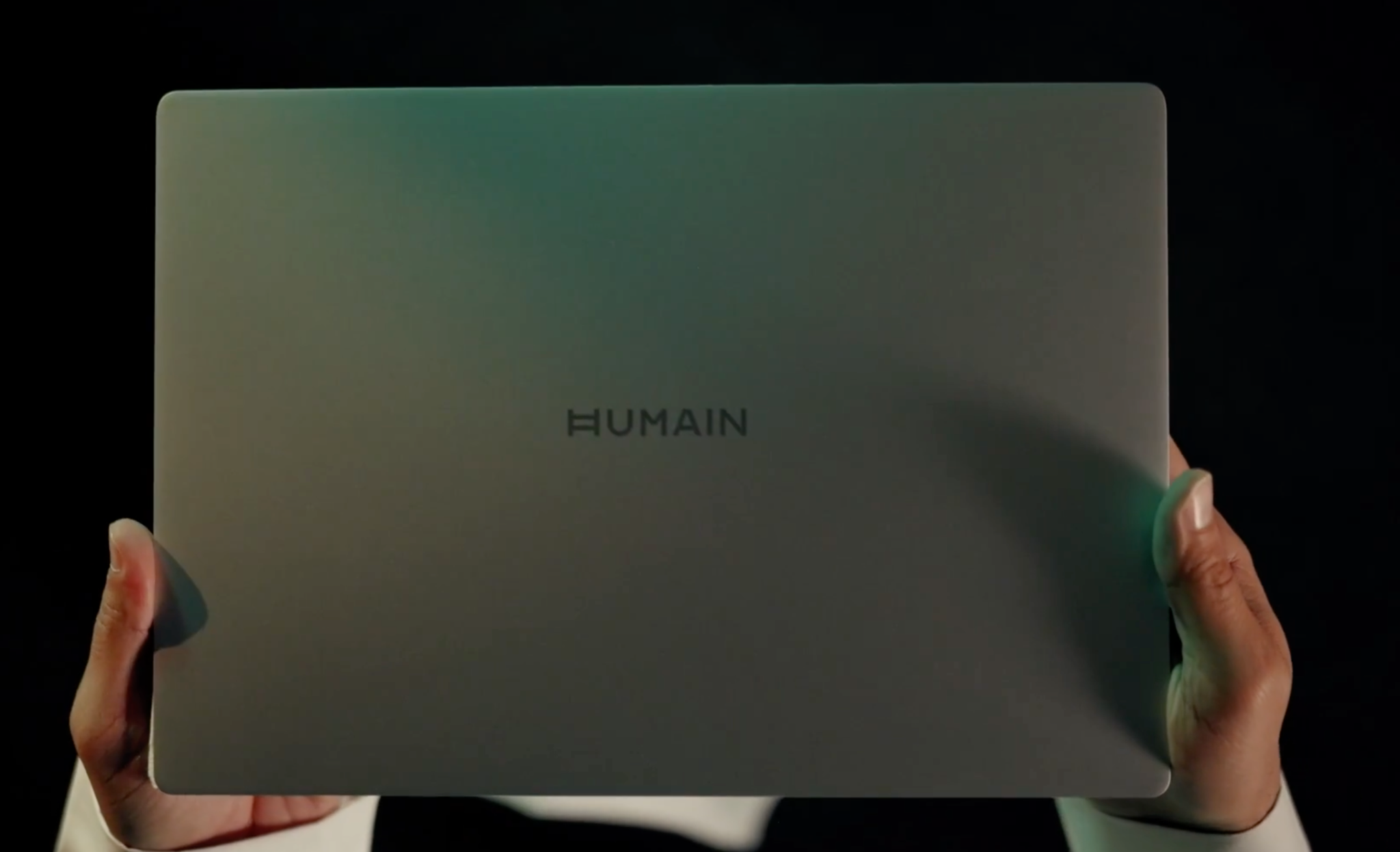 HUMAIN Horizon Ultra laptop with silver lid and HUMAIN branding in a teaser shot