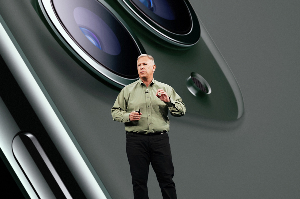 Phil Schiller presents on stage at an Apple product event