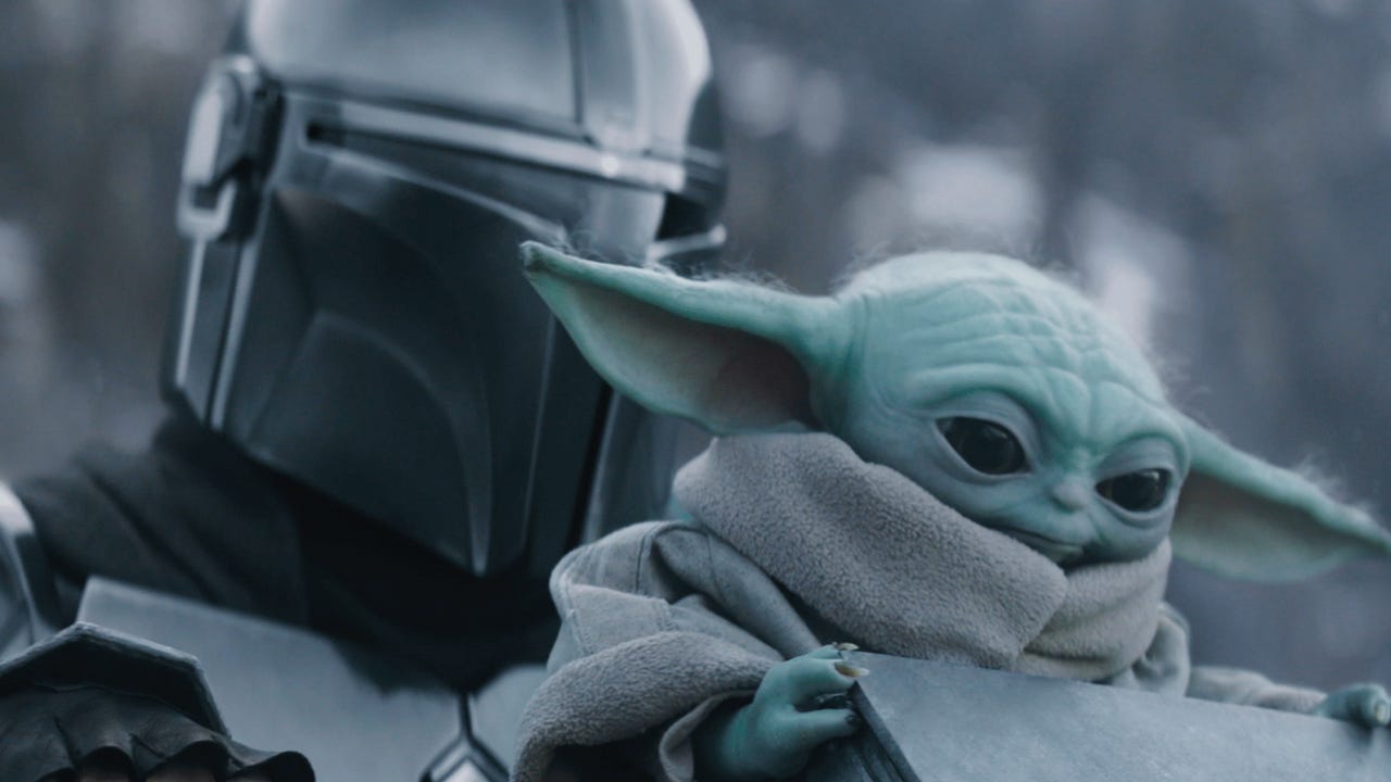 The Mandalorian and Grogu key art with Din Djarin and Grogu