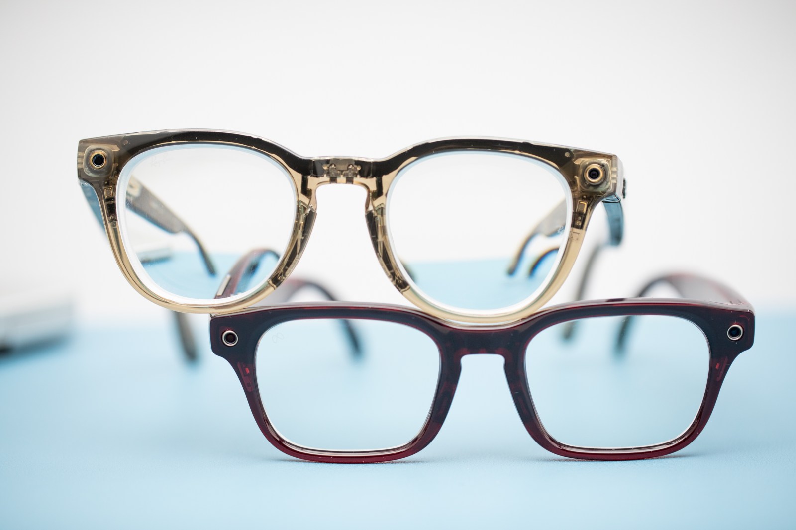 Two pairs of Ray-Ban Meta Gen 2 smart glasses with camera modules on the temples