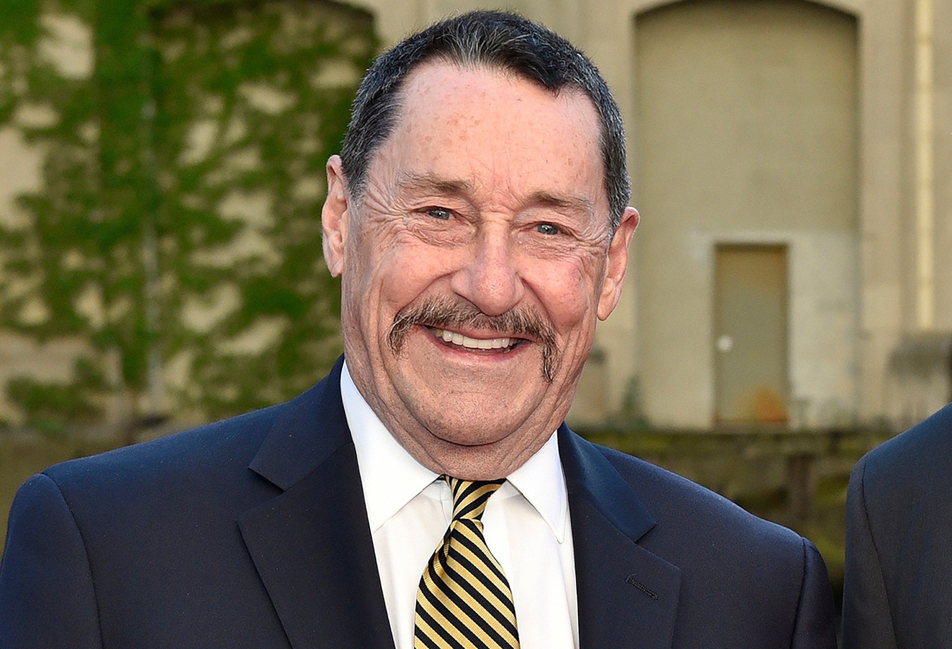 Peter Cullen, the voice of Optimus Prime in Transformers, smiling at the 2017 film premiere