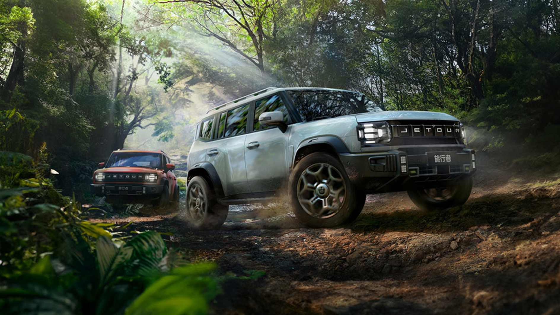 Jetour T2 boxy 4x4 SUV climbing a muddy forest trail in silver