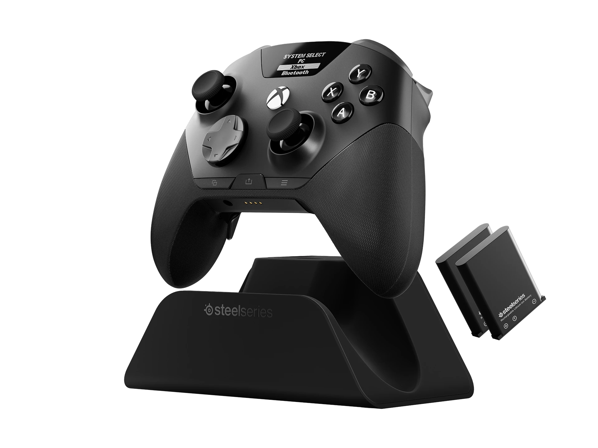 Black SteelSeries Aeon Pro controller with dock and spare batteries