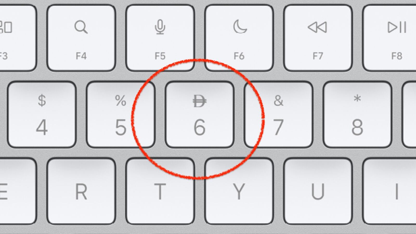 UAE dirham symbol highlighted on the number six key in keyboard concept