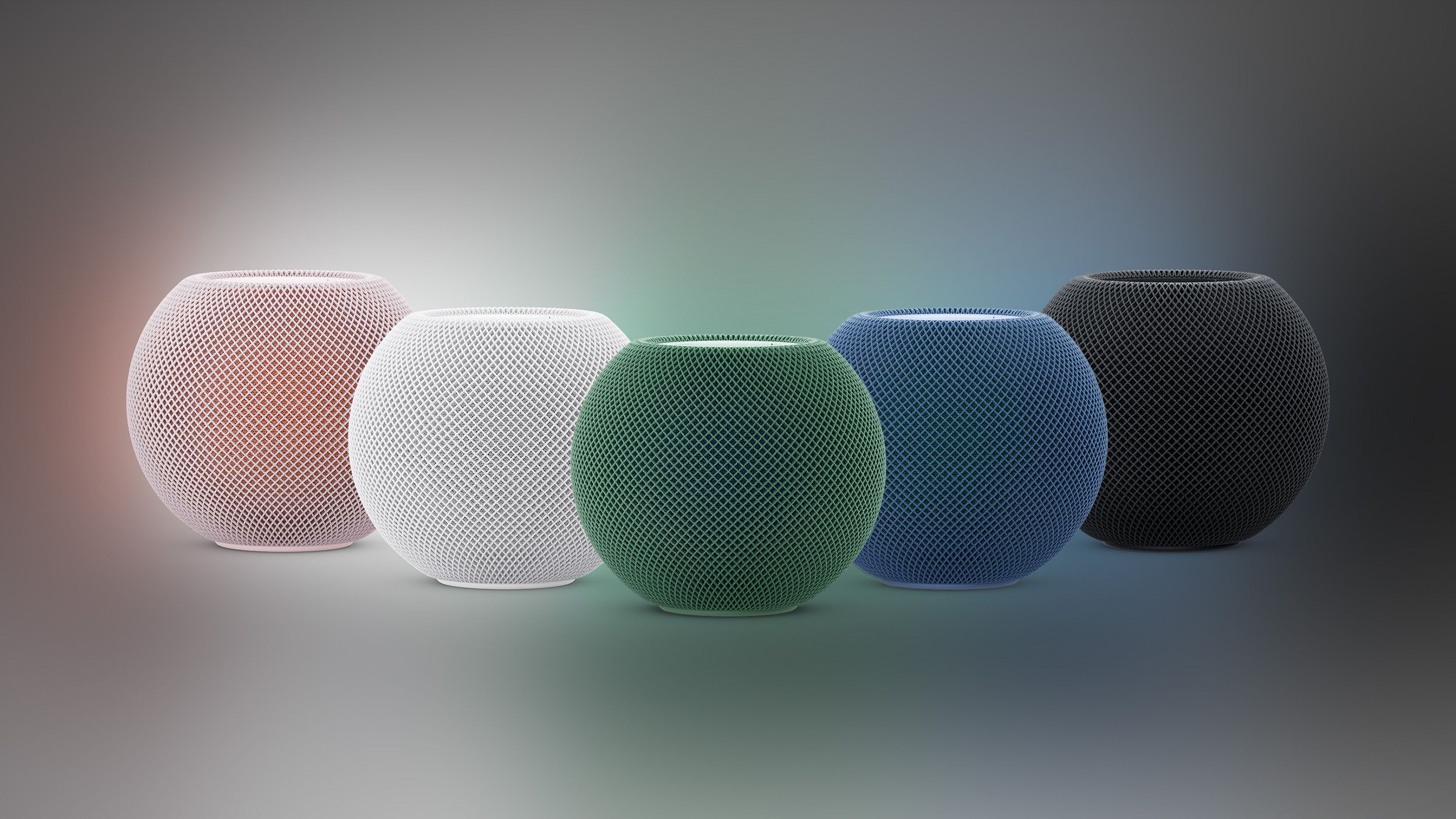 HomePod mini 2 speakers in five reported colours on gradient background