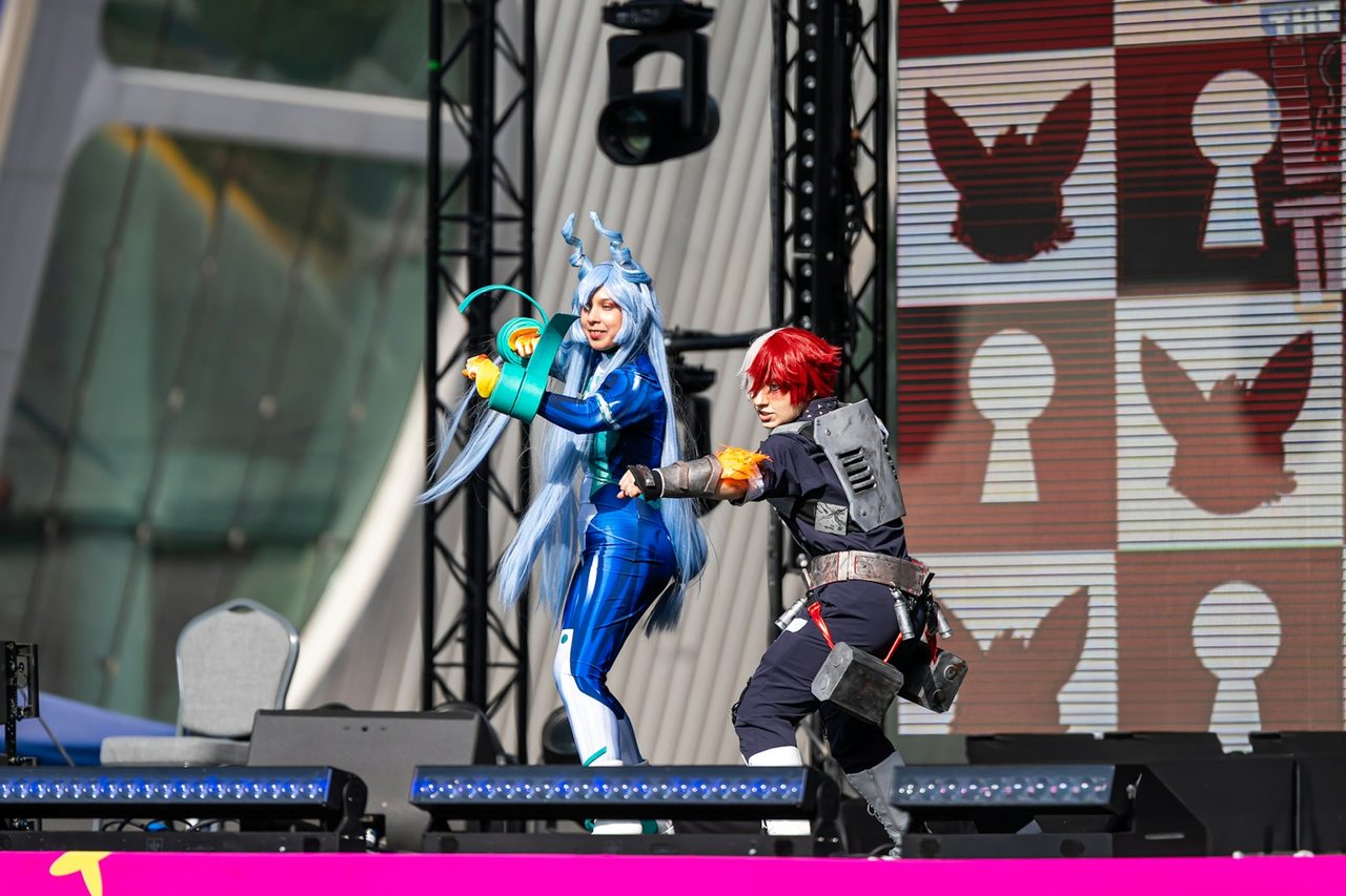 Cosplayers on a catwalk at MEFCC Otaku District in Abu Dhabi