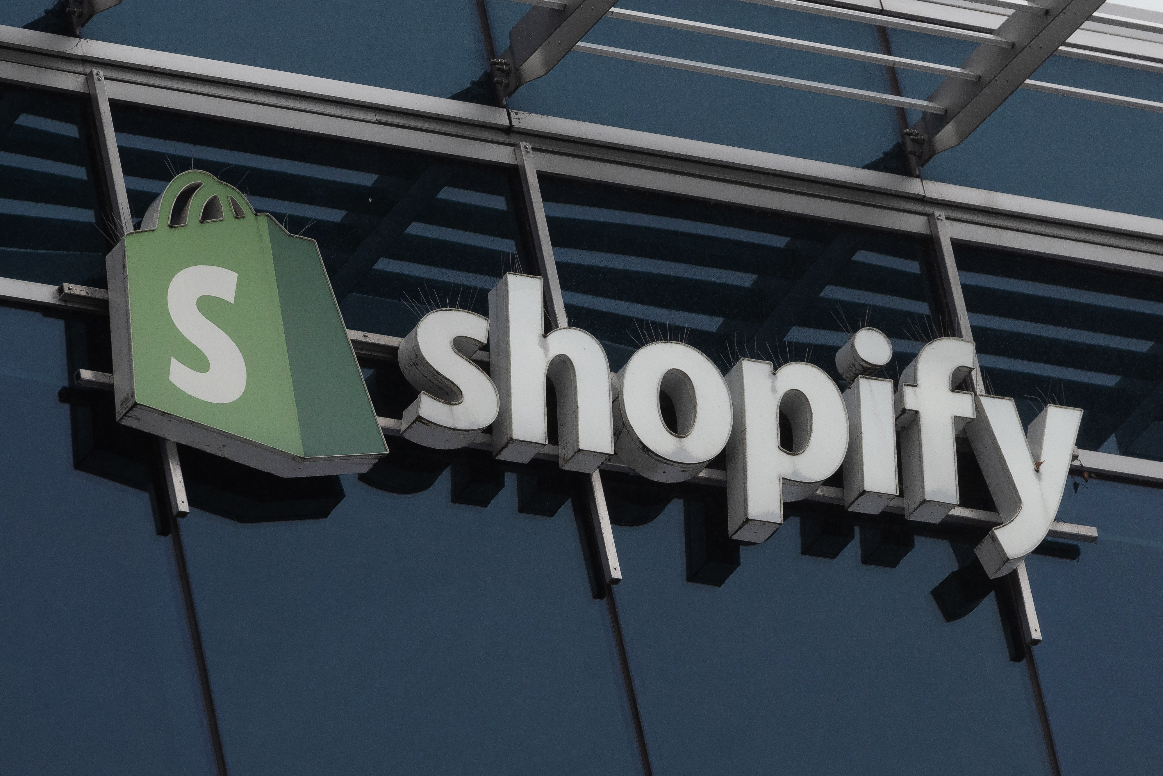 Shopify signage on the glass exterior of its former Ottawa headquarters